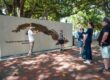 Carved map of Cuba and Jose Marti quote wall in Little Havana, Miami.